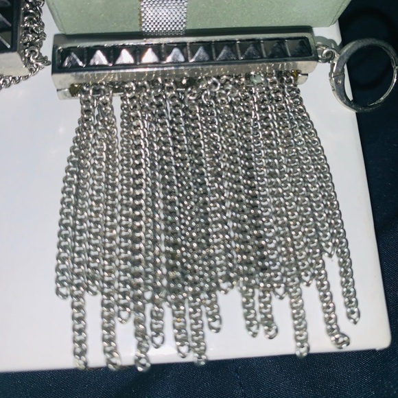 Silver metal tassel earrings. - Picture 2 of 3